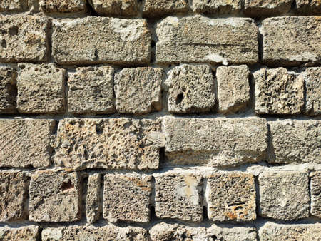 Old brick wall texture, weathered stonewall background with copy spaceの写真素材