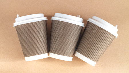 Eco friendly craft biodegradable paper cups with caps top viewの写真素材