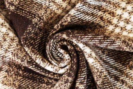 Brown and white checkered wool or tweed textile backgroundの写真素材