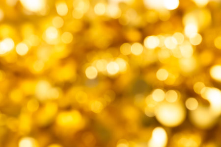 Beautiful blur bokeh golden lights backgroundの写真素材