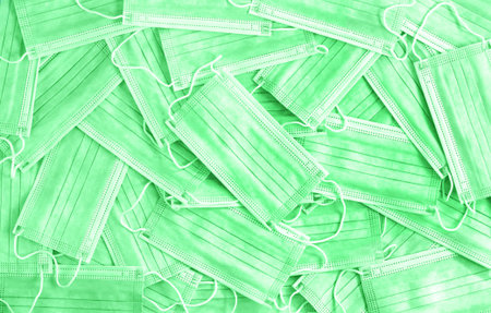 Heap of medical protective surgical disposable masks top view