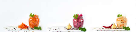 Banner of fermented vegetables in jars isolated on white backgroundの写真素材
