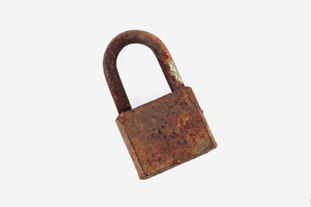 Old rust padlock isolated on white background. top viewの写真素材