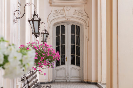 Elegant vintage front door and beautiful old building facade