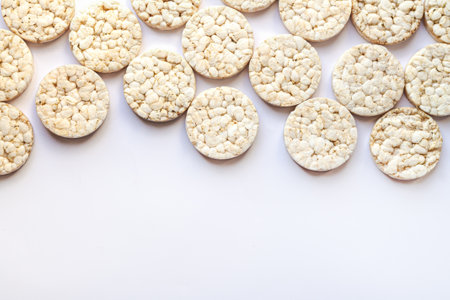 Group of healthy puffed rice cakes isolated on white. Space for textの写真素材