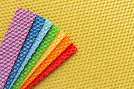 Set of colorful beeswax honeycomb from a bee hive for making handmade organic natural candles