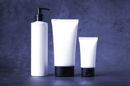 Skincare beauty products on blue background, set of cosmetics mock-up bottles and tubes for body careの写真素材