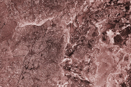 Beautiful vintage textured dark red background with scratches, scuffs and stainsの写真素材