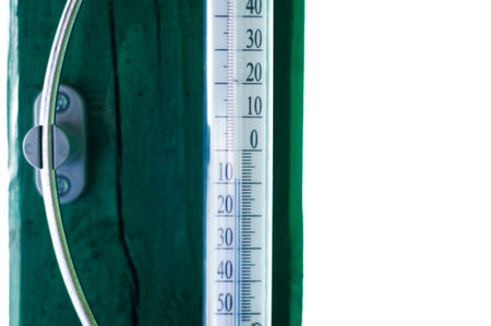 The thermometer on the wall