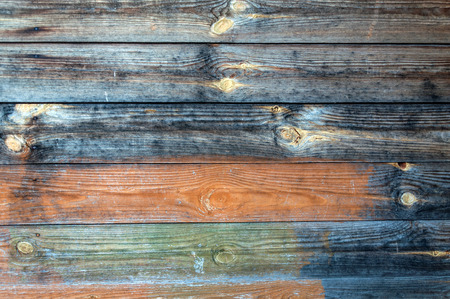 Texture of a wall of unpainted wooden boardsの写真素材