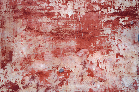 The texture of the old concrete wall is red and white.の写真素材