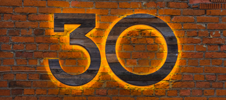 Figure 30 on a brick wallの写真素材