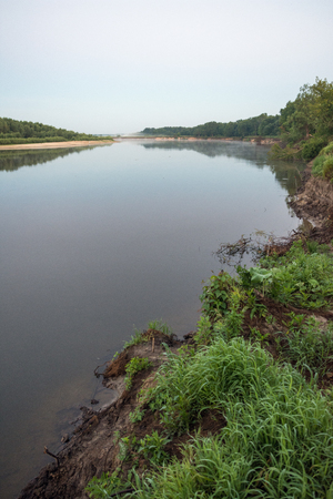 Oka river in the morning and fishing rodsの写真素材
