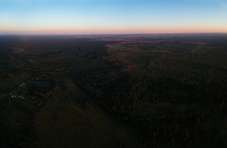 Views of a vast array of the forest at sunset with visocityの写真素材