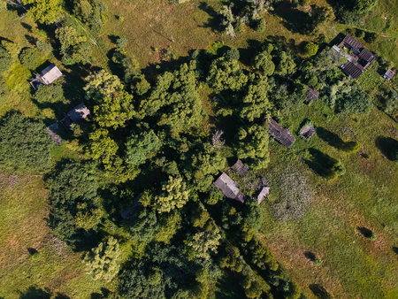 Abandoned Russian village in the forest from a heightの写真素材