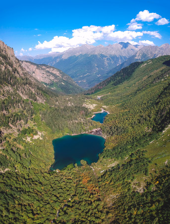 Baduk lakes from the height of the quadrocopter in summer, Alpine lakes among the mountains with forestの写真素材