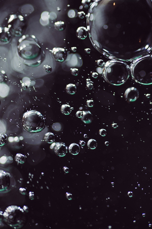 Bubbles in the water close-upの写真素材