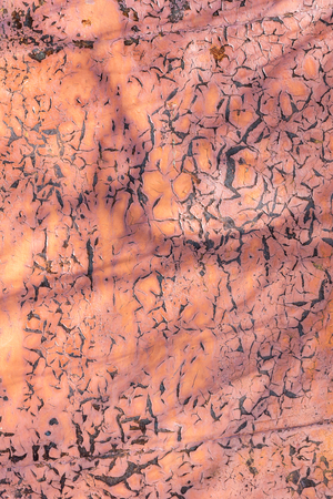 Texture of the old rusty wall of red colorの写真素材