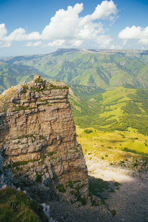 A large panorama of the Bermamyt plateau on a summer day. Hills and clouds in the distance.の写真素材