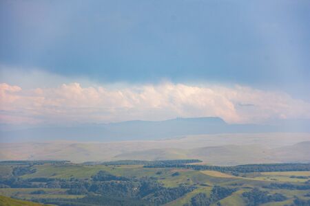 Mountains And plains away in summerの写真素材