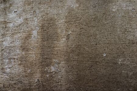 Texture of concrete wall and foundation close-up with falling off paintの写真素材