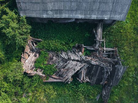Old abandoned house in a Russian village from the height of a quadrocopterの写真素材