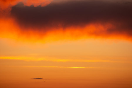 Pink clouds close up at sunset in the evening
