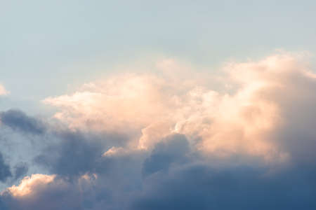 Beautiful rain clouds close-up before sunset. Cumulus clouds close upの写真素材