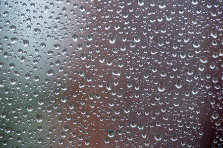 Macro photo of a drop on the glassの写真素材