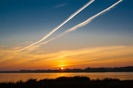 rising over the riverの写真素材