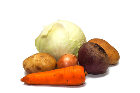Still life with cabbage potato onion carrot beet Isolated on white backgroundの写真素材