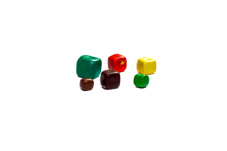 Cubes of colored plasticine isolated on white background