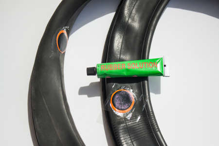 Rubber patch on the bicycle wheel ityubik rubber cementの写真素材