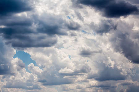 Clouds spanning the summer sky before rainの写真素材