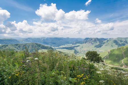 A photo of the landscape views from the pass Gum-Bashi in the mountains of the North Caucasusの写真素材