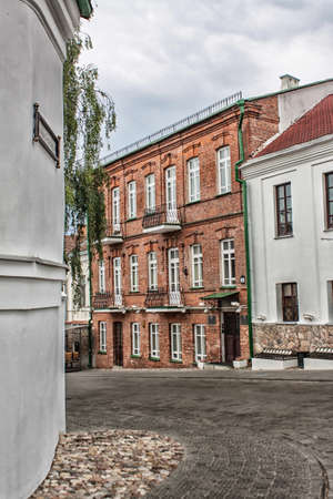 Street in the old part of Minsk the capital of Belarus in cloudy weatherの写真素材