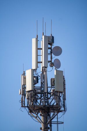 Tower with cellular antennas on the background of the skyの写真素材
