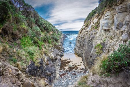 Rocks above the ocean on the East coast of Australiaの写真素材