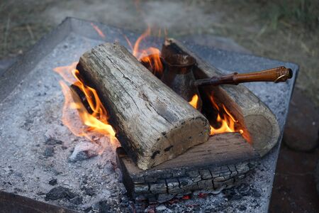 cooking coffee on the fireの写真素材