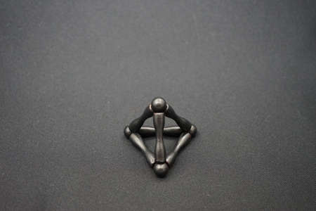 Minimal concept of triangle decoration on black backgroundの写真素材