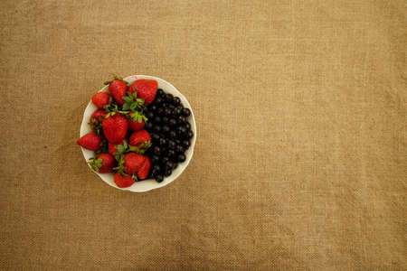 berry on the burlap fabric, canvas, backgroundの写真素材