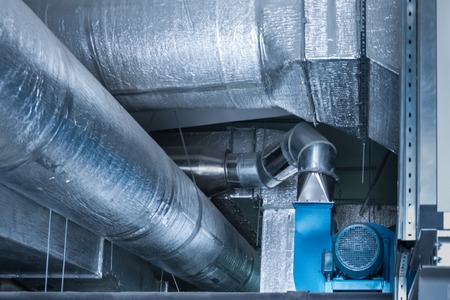 Blue centrifugal fan with huge size industrial ductworksの写真素材