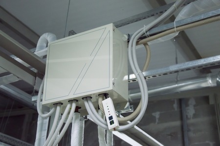 Closed control cabinet for DX coil of air handling unit in the industrial ventilation roomの写真素材