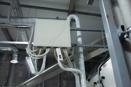Closed control cubicle for DX coil of air handling unit in the industrial ventilation room