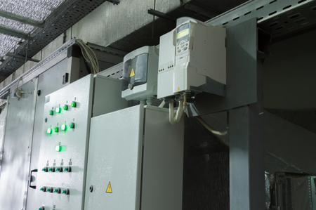 Two closed ventilation system control cabinets in the industrial ventilation roomの写真素材