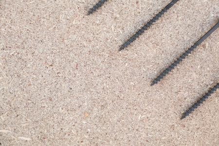 Background with copy space on the hobby, DIY, hand tools, house repairing theme. Screws on the...