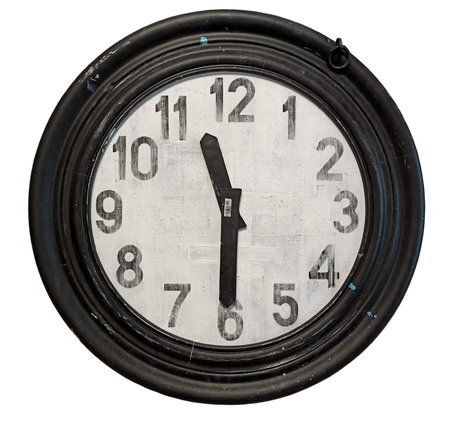 Vintage clock in a round wooden frame