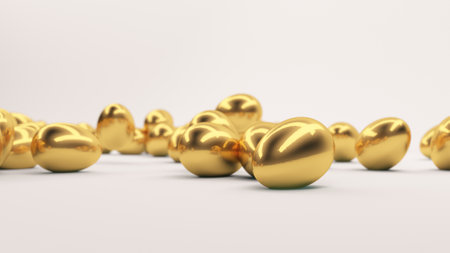 Multiple golden eggs scattered across a smooth white surface with soft reflections, creating a sleek and modern visual composition representing prosperity and investment.の写真素材