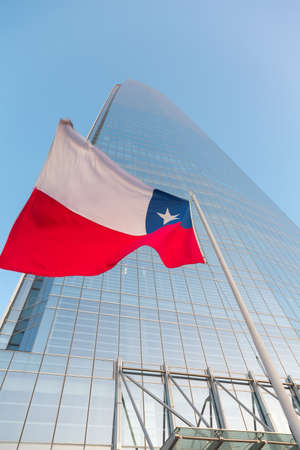 Chilean flag on the background of skyscraperの写真素材