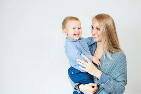 woman with a baby on white backgroundの写真素材
